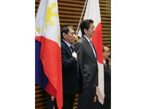 UPDATE - Duterte claims China visit about economics, not arms