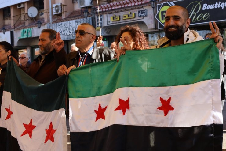 People in southern Syria celebrate liberation of Aleppo, Idlib